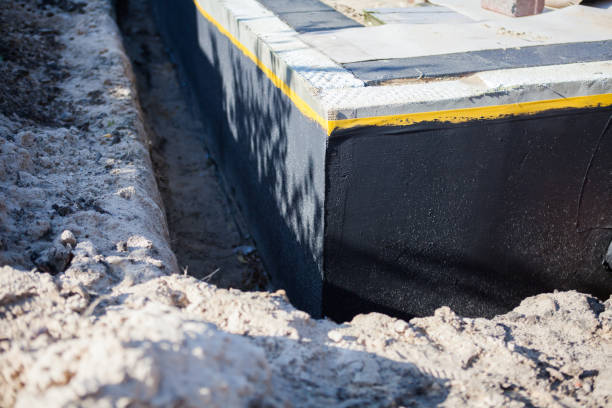 Professional Waterproofing technician working in Mendon, IL